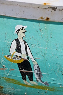 Painting on a fishing boat, Alexandria  