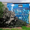 Street art. Léopard sur fond bleu